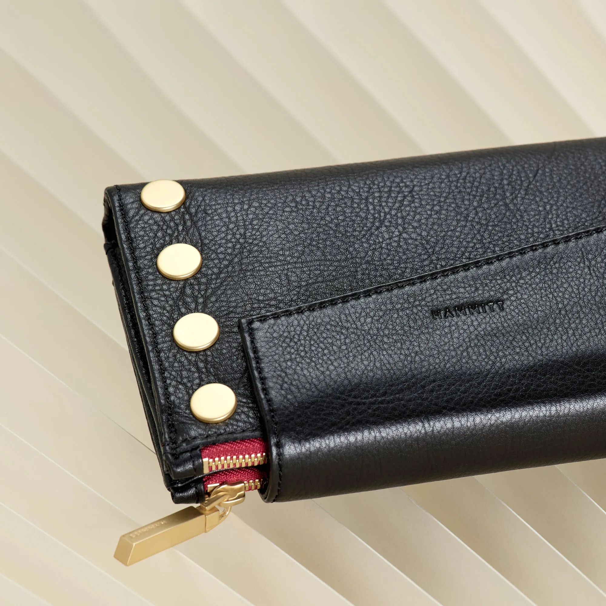 Levy | Black/Brushed Gold Red Zip